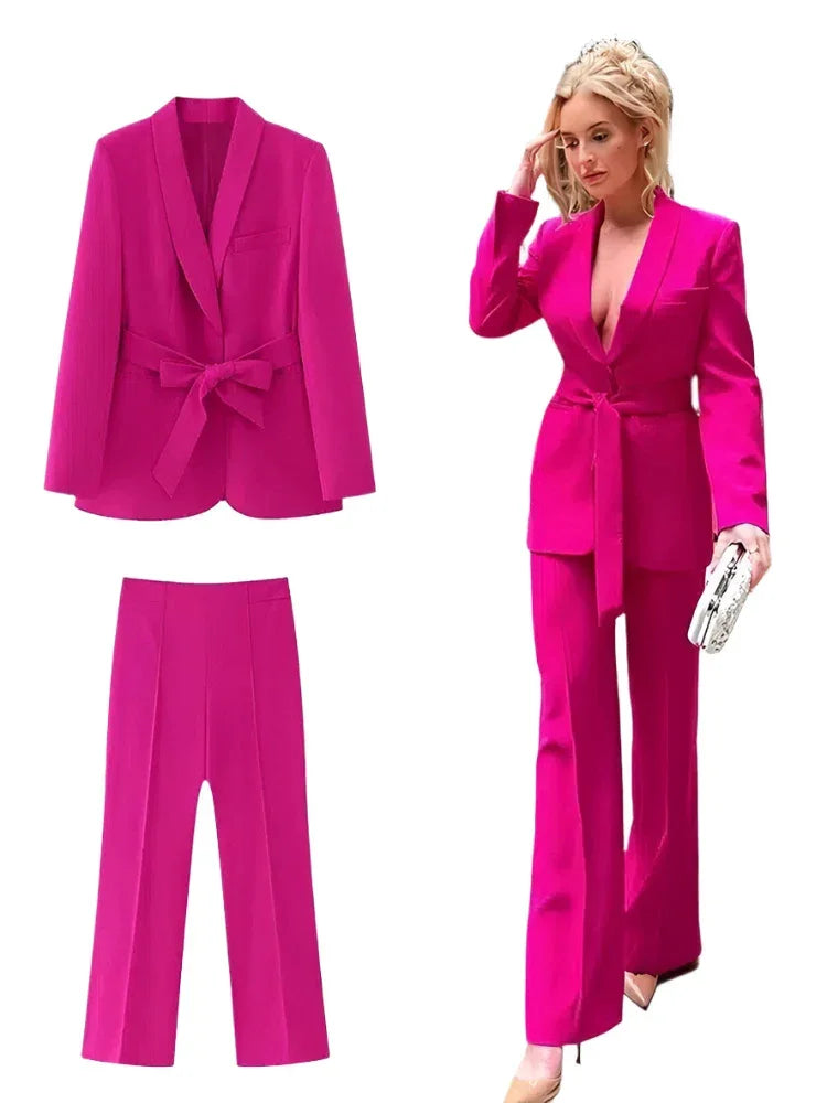 Hot pink belted blazer and trouser set shown flat and worn by a model fashion image