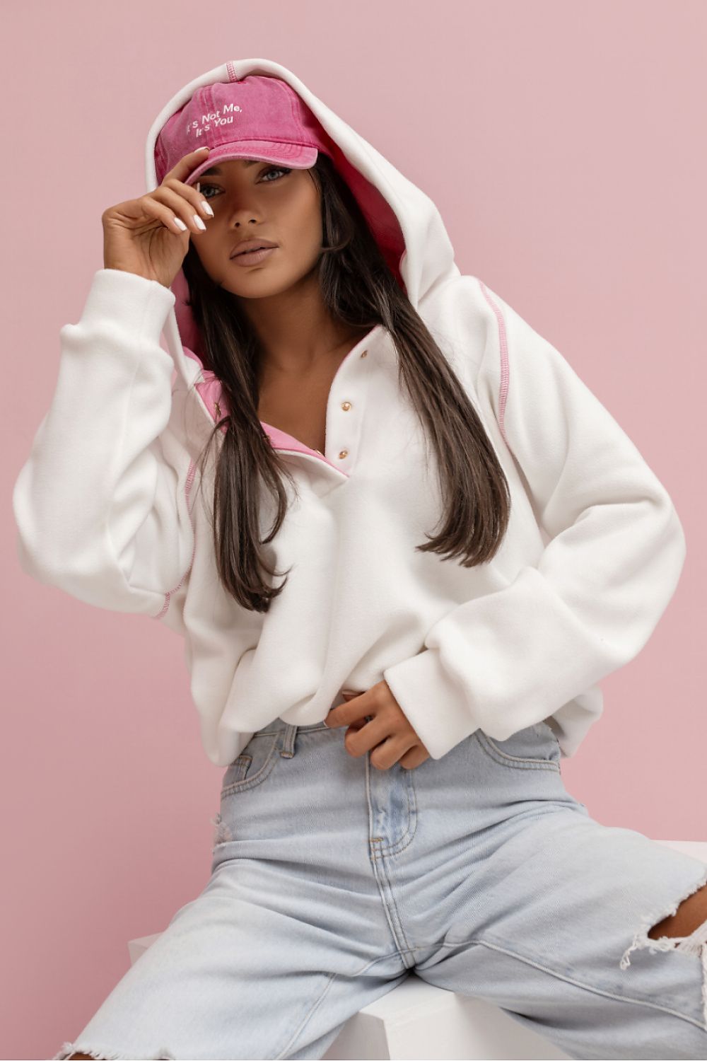 Women's hoodie beige logo detail view