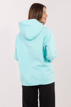 Women's hoodie green second shade logo detail view