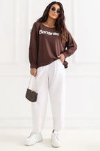 Women's sweatshirt brown sleeve patch detail view