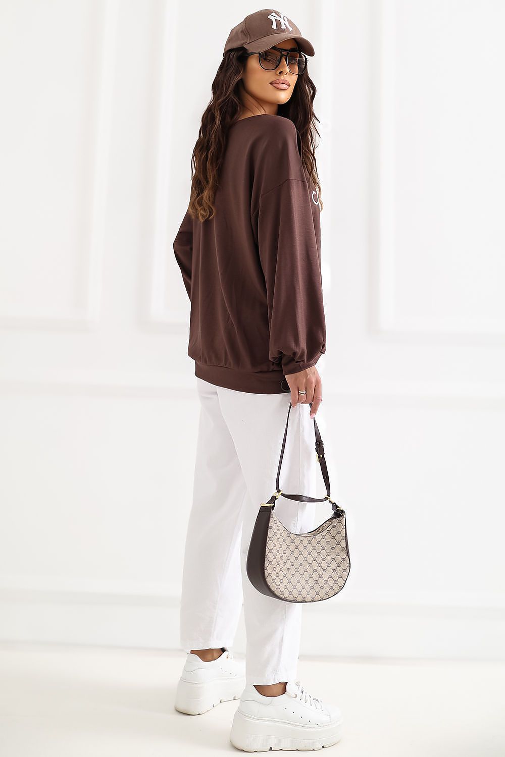 Women's sweatshirt brown puff sleeve side view